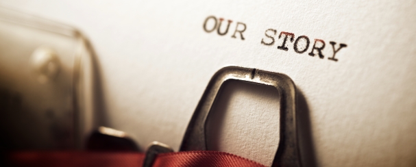 Zoomed in typewriter with "Our Story" typed on the paper