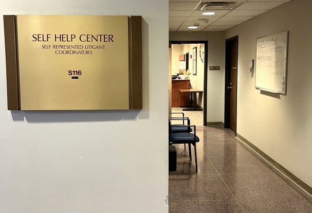 Entry sign on a wall that says Room S116 on El Paso Judicial Building.